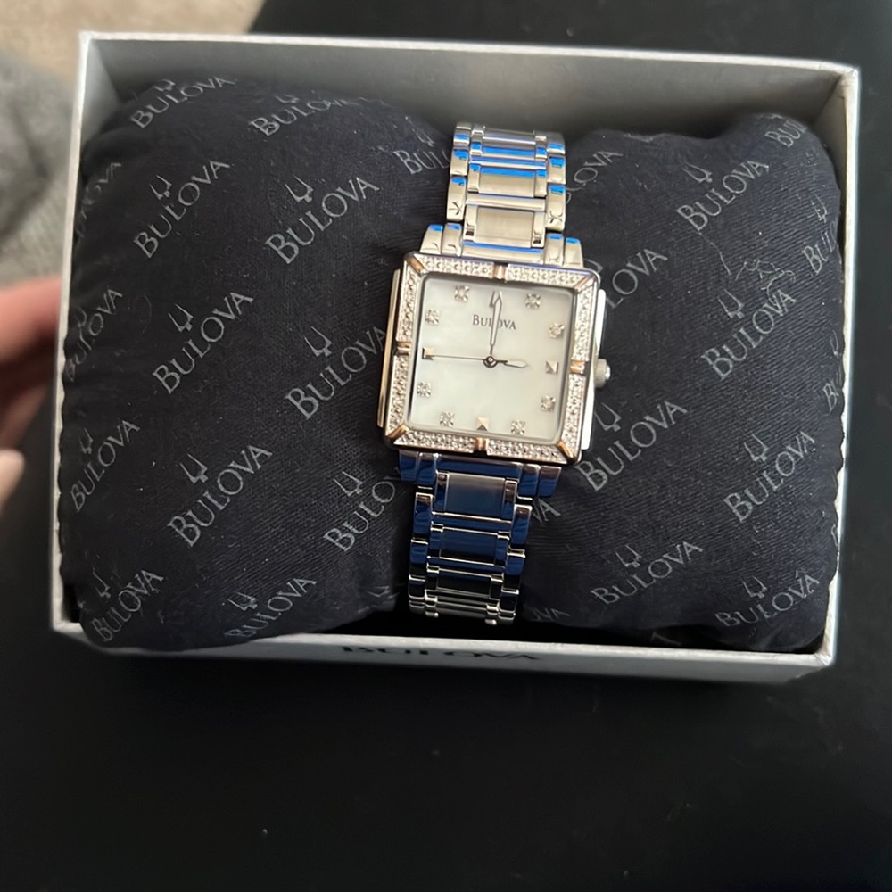 Bulova Ladies diamond and mother of Pearl dial watch. Stainless steel, quartz